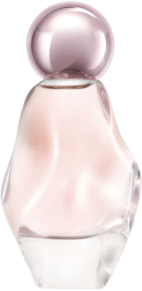 A perfume bottle with a round pink cap and a softly curved, clear glass body.
