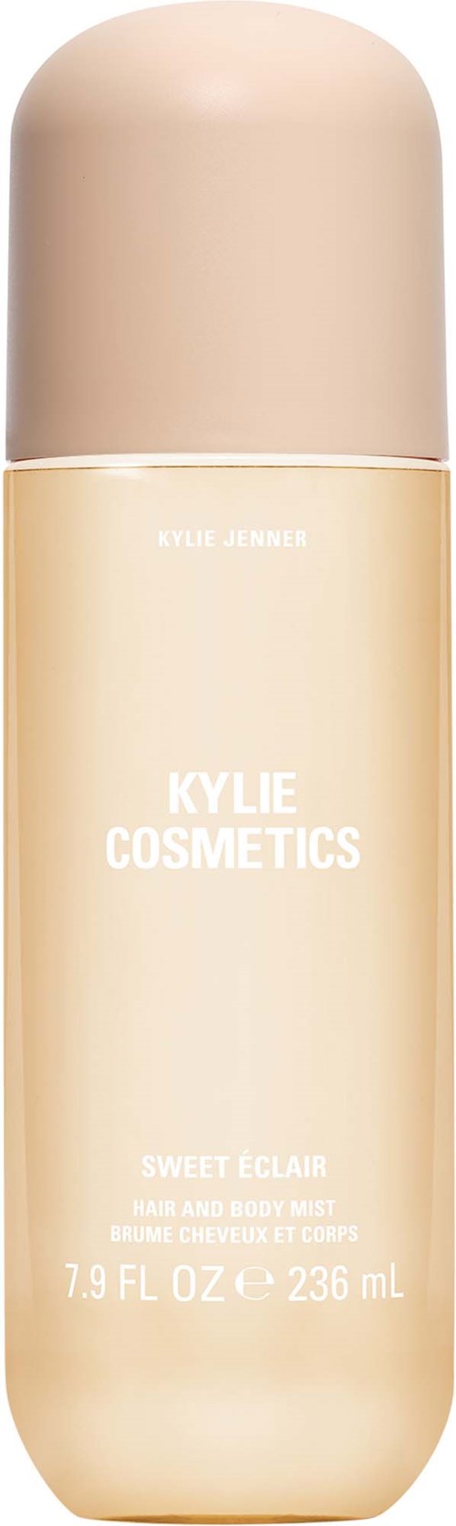 Beige pystymäinen pullo, merkintä KYLIE COSMETICS, Sweet Eclair tuoksu, 7.9 fl oz, 236 ml.