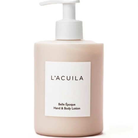 Beige pumppuppruoka, jossa lukee L'ACUILA Belle Époque käsivoide ja vartalovoide.