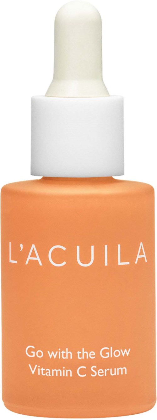 Kleine oranje fles met witte pipetdop en witte tekst, gelabeld 'L'ACULA Go with the Glow Vitamin C Serum.'