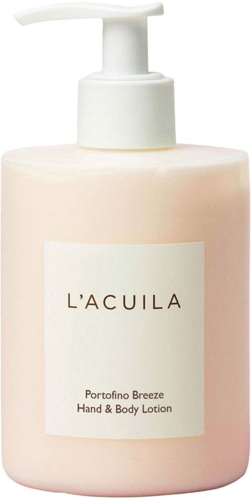 En rosa lotionflaska med vit pump märkt L'ACUILA, Portofino Breeze Hand & Body Lotion.