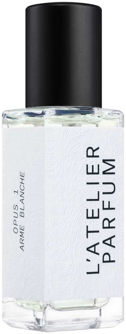 A clear perfume bottle with a black cap and white label that says 'L'ATELIER PARFUM' and 'OPUS 2 ARPE MAC BLANCHE.'