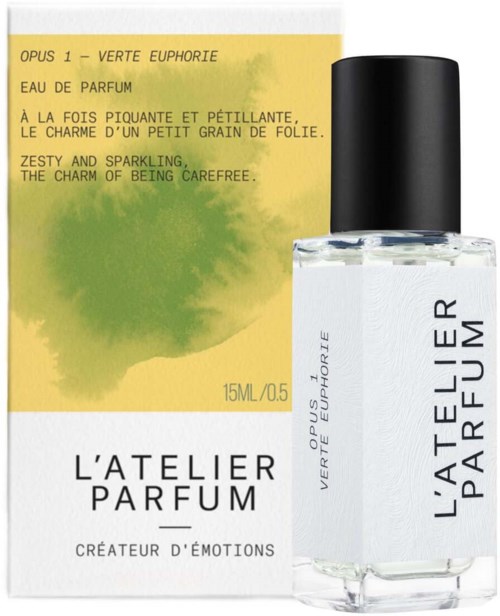 A small perfume bottle with a black cap, along with a yellow and green box featuring perfume details and brand name.
