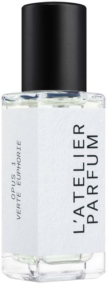 A clear perfume bottle with a black cap, labeled 'L'ATELIER PARFUM' and 'VERTUS D'EUROPE' in black text.
