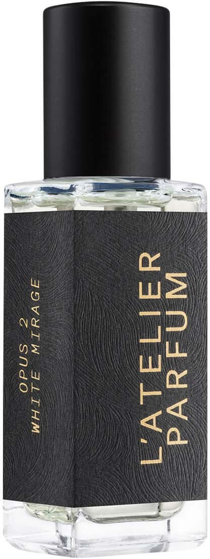 A small perfume bottle with a black cap and a black label, gold text, and transparent glass.