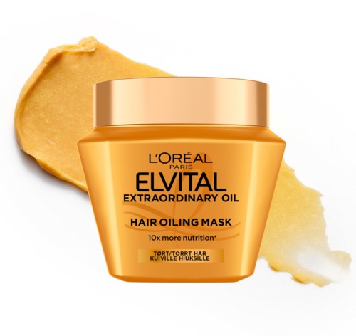 L'Oréal haarmasker in een gouden container met een romige substantie eromheen.