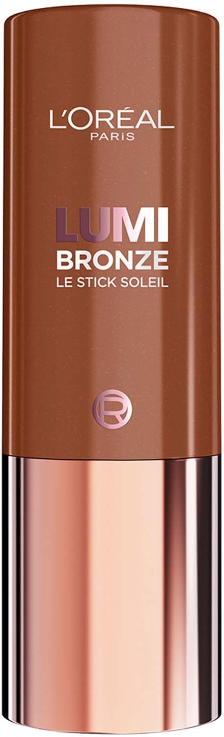 Een bruine stift met een glanzende onderkant en een label dat L'Oreal, LUMI BRONZE zegt en het beschrijft als een zonstick.