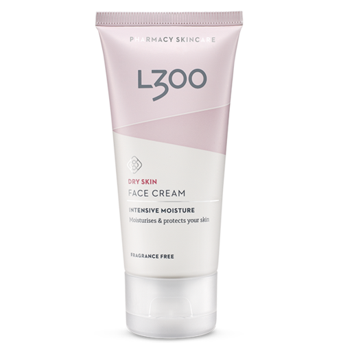 Eine weiße Tube mit Gesichtscreme 'LZOO' für trockene Haut, parfümfrei, mit rosa und weißen Designs.