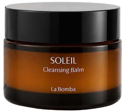 Gulbrun krukke med Soleil Rensende Balm fra La Bomba med svart lokk.