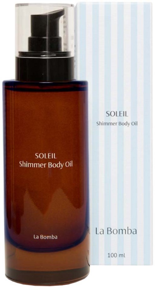 En brun flaske med Soleil Shimmer Body Oil og pumpe, ved siden av en stripete lys blå og hvit eske.