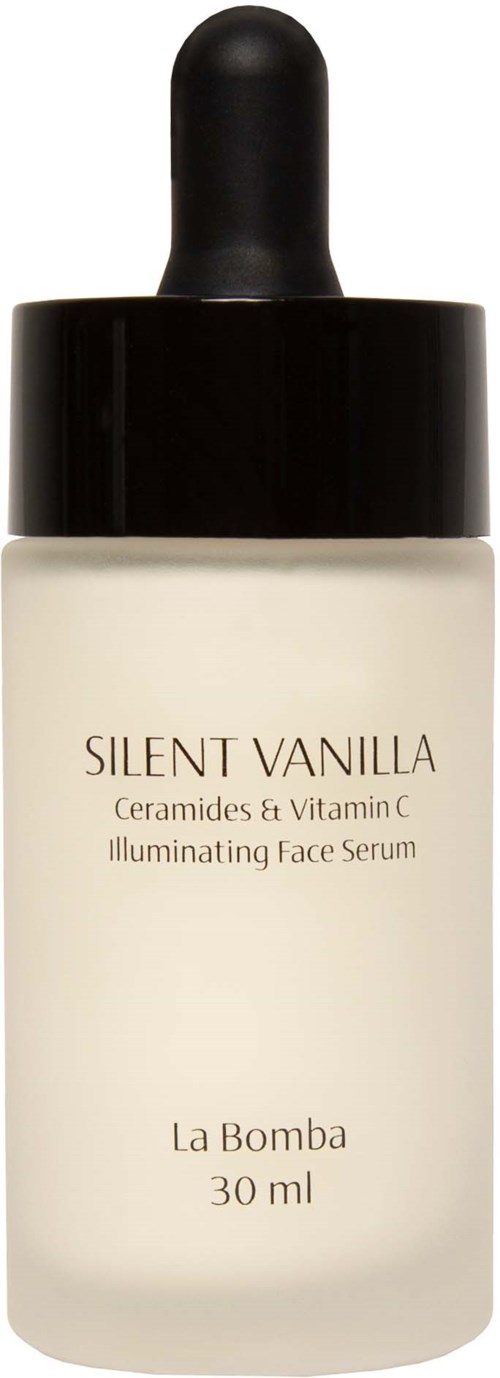 En hvit flaske med Silent Vanilla opplysende ansiktsserum med svart pipettekork, merket med produktnavn og størrelse.