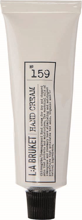 En hvit tube med svart lokk, merket 'L:A BRUKET HAND CREAM NO 159', med liten tekst på etiketten.