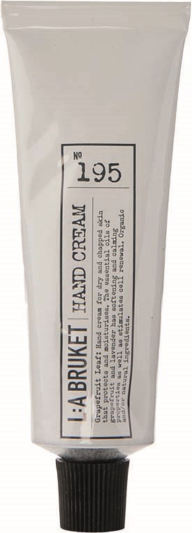 Een witte tube met zwarte dop, gelabeld 'L:A BRUIXET HAND CREAM' en het nummer 195.