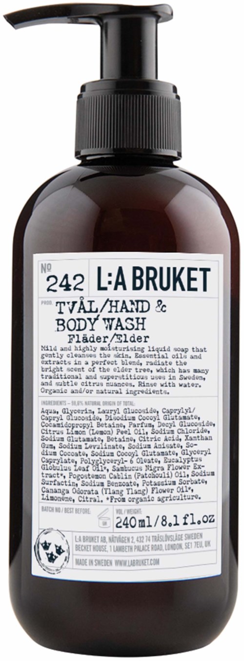 Een donkergekleurde fles met pomp, gemarkeerd L:A Bruket, bevat hand- en lichaamswas voor douche of bad.