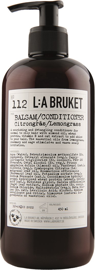 Eine braune Flasche mit L: A BRUKET Conditioner, schwarzer Pumpe und weißem Etikett mit Inhaltsstoffen und Marke.