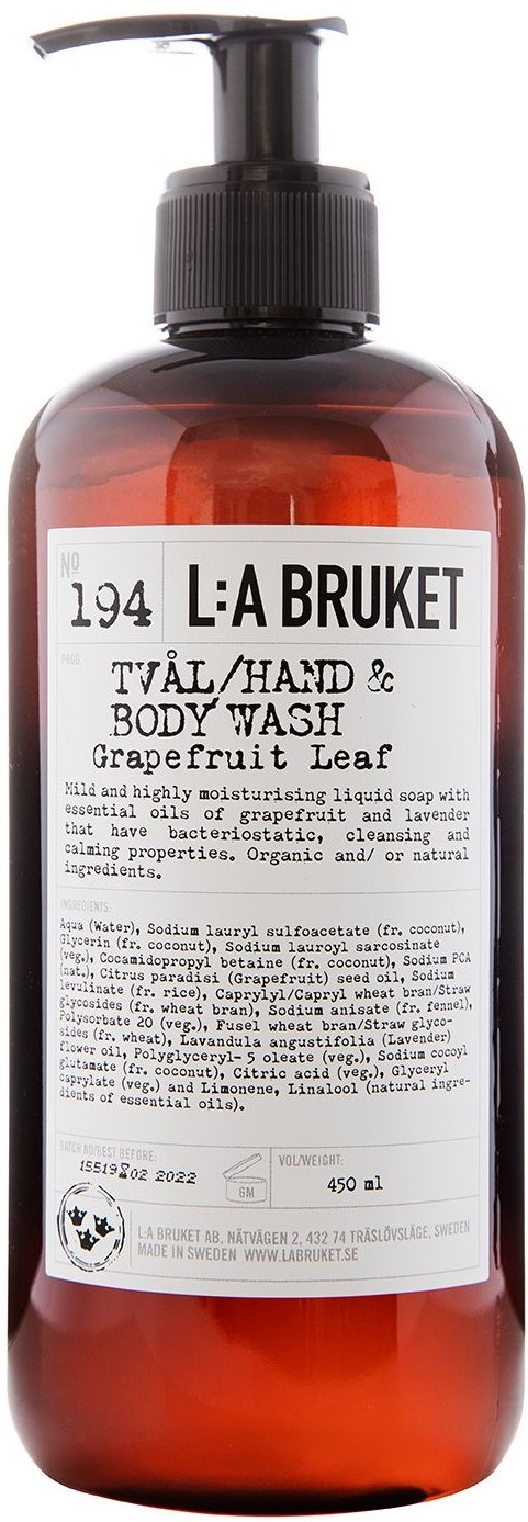 A brown bottle with a black pump, labeled as grapefruit leaf scented body wash, 450 ml volume.