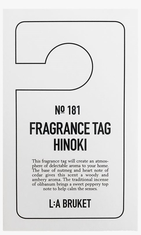 Ein Duftetikett mit der Aufschrift Hinoki, Nummer 181, mit Details zum Duft und Aroma sowie einem Hinweis auf traditionellen Weihrauch.