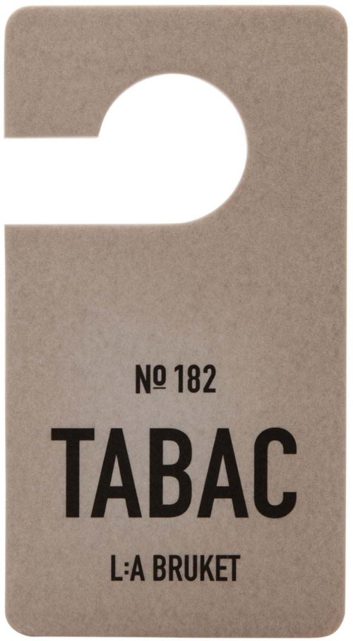 Etiket met de tekst "TABAC" en nummer 182, met extra kleine tekst eronder.