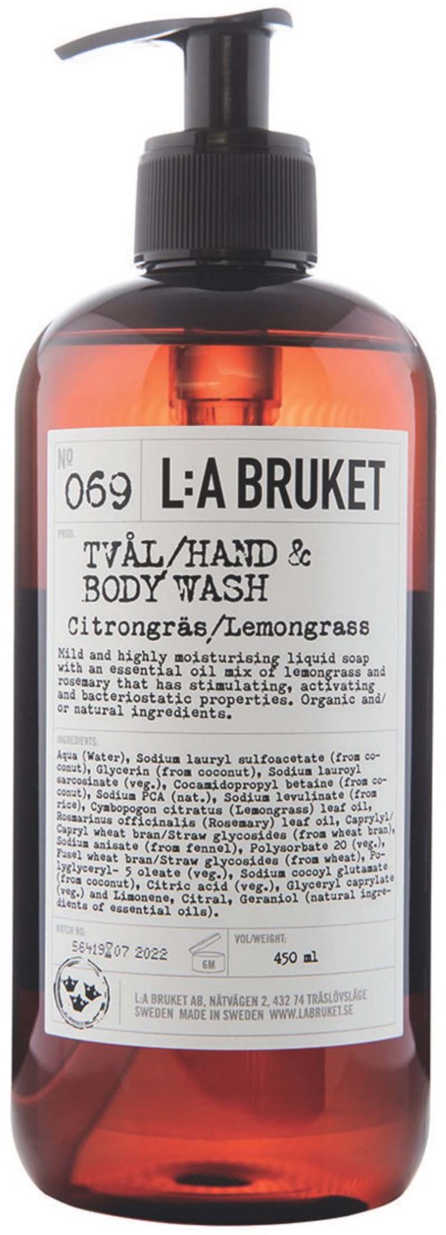 Eine Flasche Zitronengras-Hand- und Körperwäsche mit Pumpenspender. Sie hat ein weißes Etikett mit schwarzem Text und Markennamen.