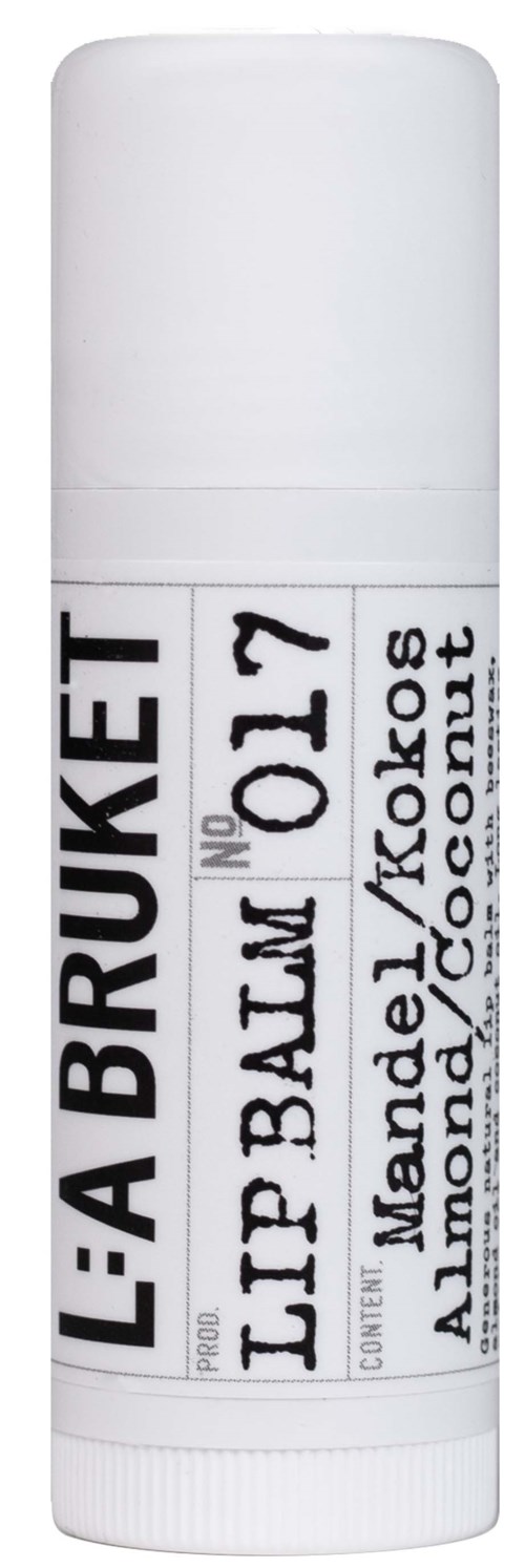Lippenbalsam in weißer Tube mit der Beschriftung "L'A BRUKET" und Geschmack Mandel, Kokos und Mandel.
