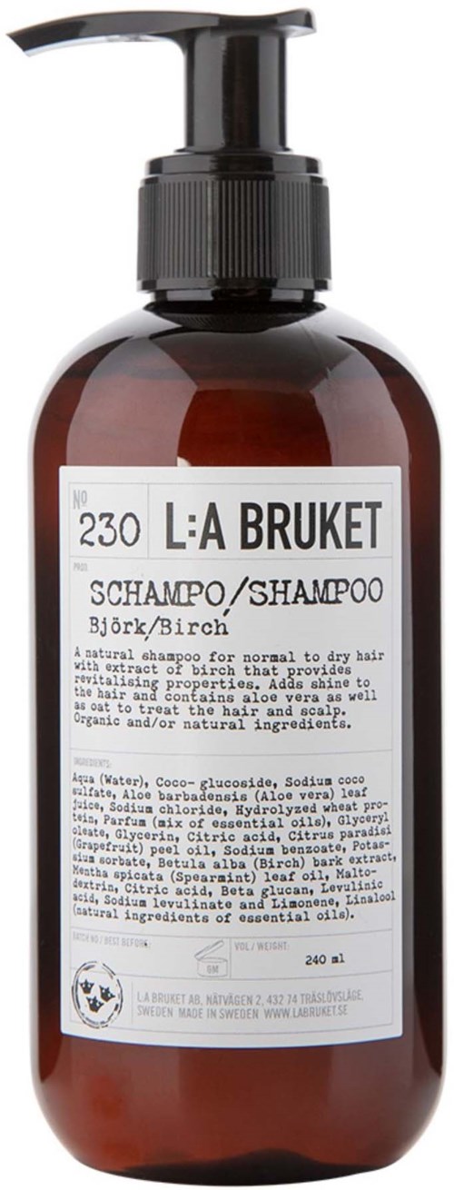 Braune Flasche mit Pumpkopf, etikettiert 'L:A Bruket' Shampoo für normales bis trockenes Haar.