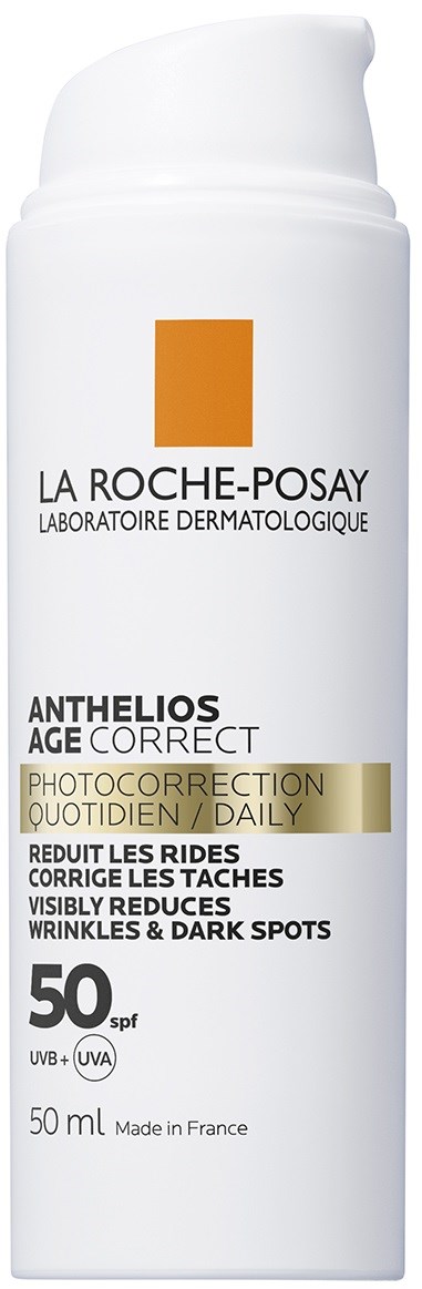 A white bottle of La Roche-Posay sunscreen with SPF 50, labeled for daily use to reduce dark spots and wrinkles.