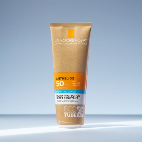A beige tube of La Roche-Posay Anthelios SPF 50+ sun lotion with orange, blue, and white labels. It says it's for ultra protection.