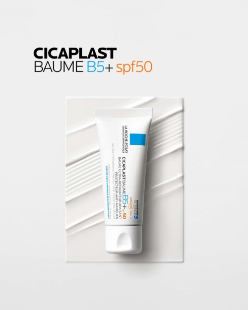 A tube of Cicaplast Baume B5+ SPF50 sunscreen with some white background and text.