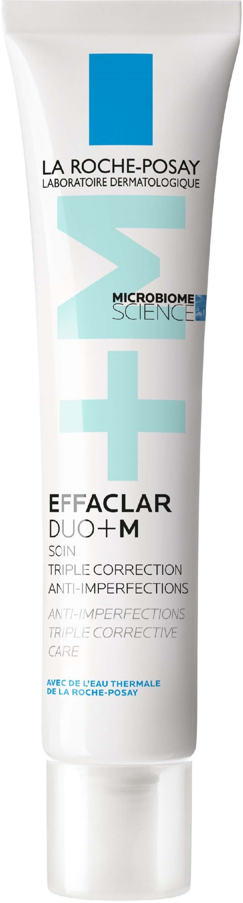 A white tube of La Roche-Posay effaclar duo+M skincare with blue text and symbols for skin correction.