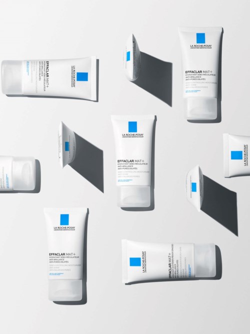 Multiple tubes of skincare products labeled 'Effaclar Mat' with shadows on a white background.