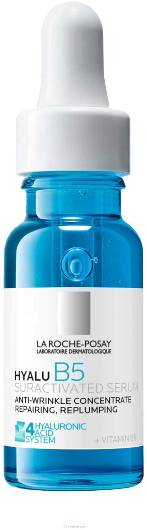 Blue glass serum bottle with white dropper cap, label shows La Roche-Posay Hyalu B5, anti-wrinkle serum for skin repair.