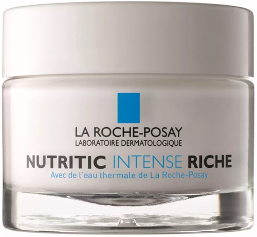 Een witte pot La Roche-Posay Nutritic Intense Riche crème met zilveren deksel en blauw logo.