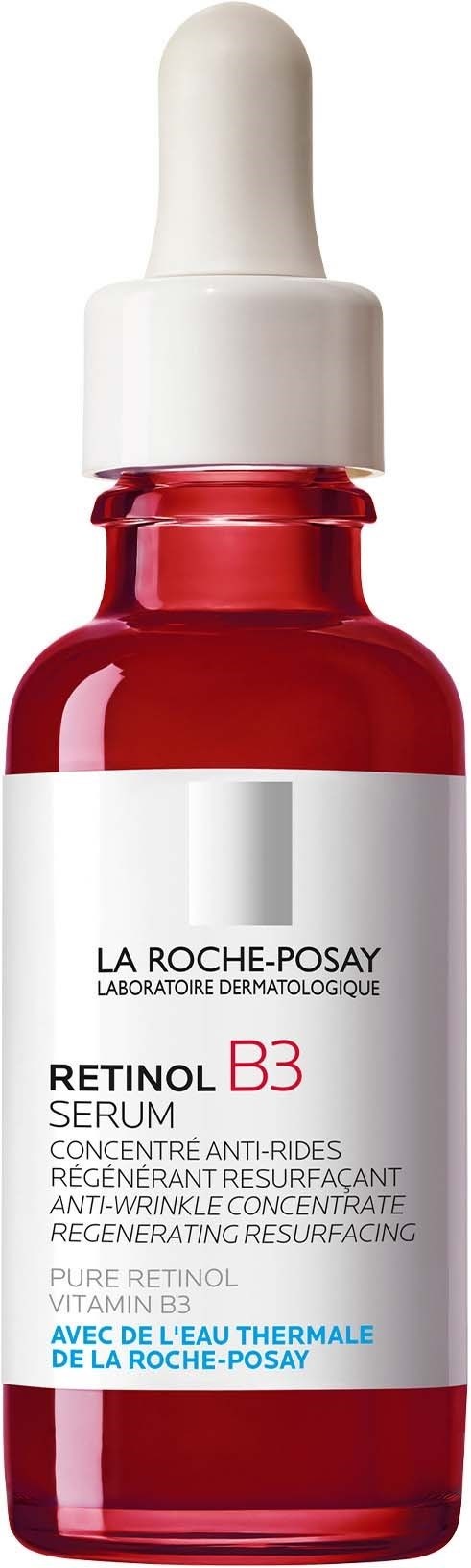 Een kleine donkerrode fles met een witte druppelkap, gelabeld La Roche-Posay Retinol B3 Serum.