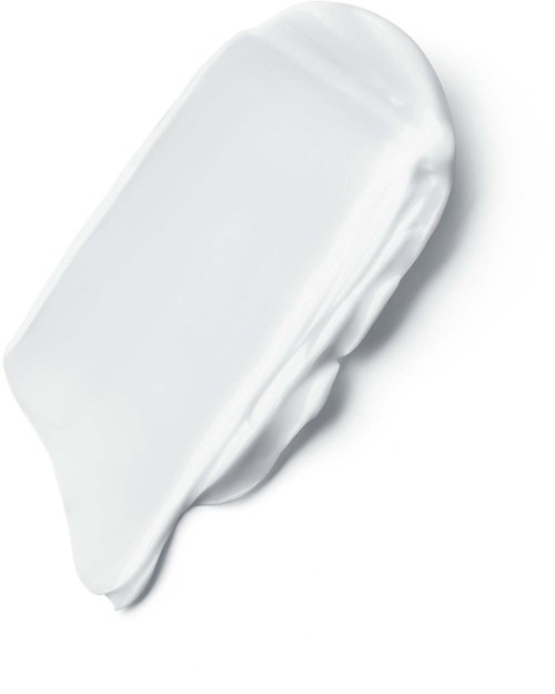 Een witte, romige substantie op een spatel, waarschijnlijk voor koken of bakken.