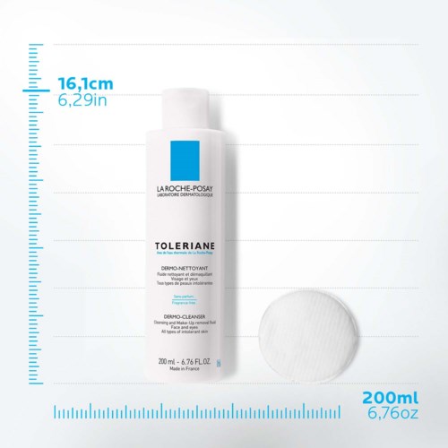 Een fles La Roche-Posay Toleriane reiniger, met een watje ernaast, gemarkeerd met maten.