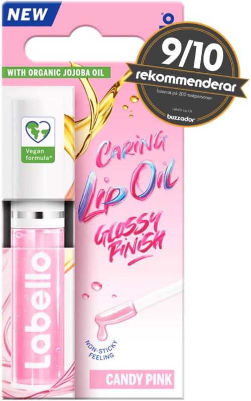 Lippenolie in een roze fles met een witte dop, op roze en witte verpakking, met een zwart en goud badge en roze tekst.
