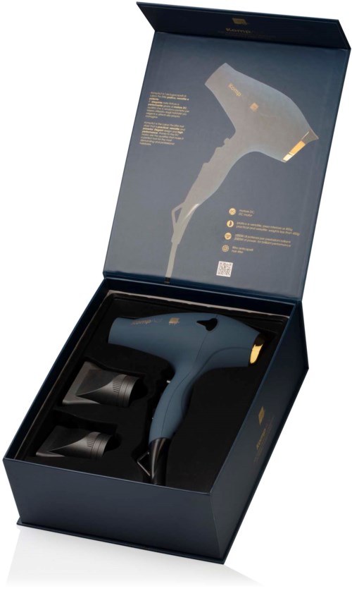 Een föhn in een zwart doosje met twee mondstukken, klaar voor gebruik of cadeau.