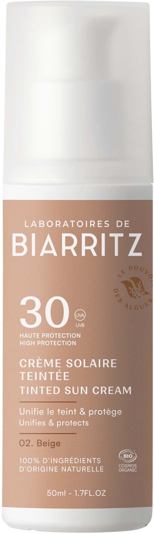 Een beige tube met getinte zonnebrand crème en witte dop, met label 'Laboratoires de Biarritz 30 SPF.'