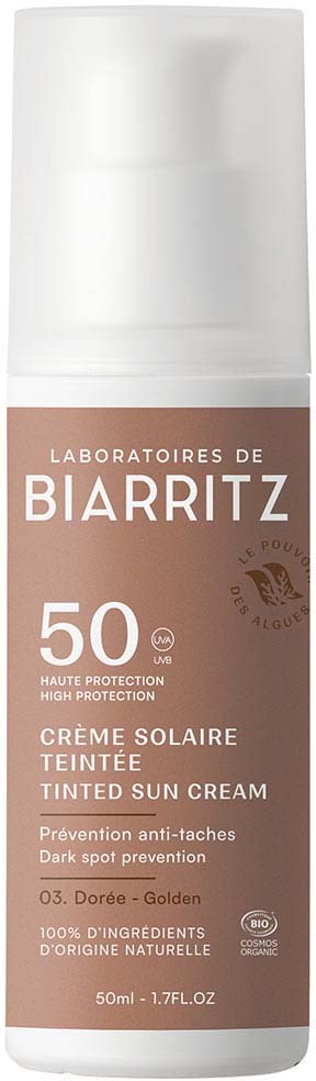 Een beige zonnebrandcrème fles met witte dop en etiket. Biedt hoge bescherming en voorkomt donkere vlekken.