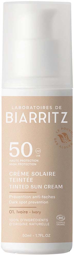 Beige fles met witte dop, getint zoncrème SPF 50, voor donkere vlekken, 50 ml.