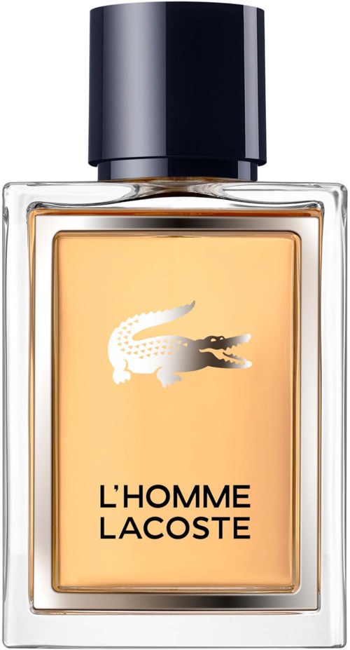 Een glaspastel met zwarte dop, met gouden vloeistof erin en Lacoste-krokodilllogo op de voorkant.