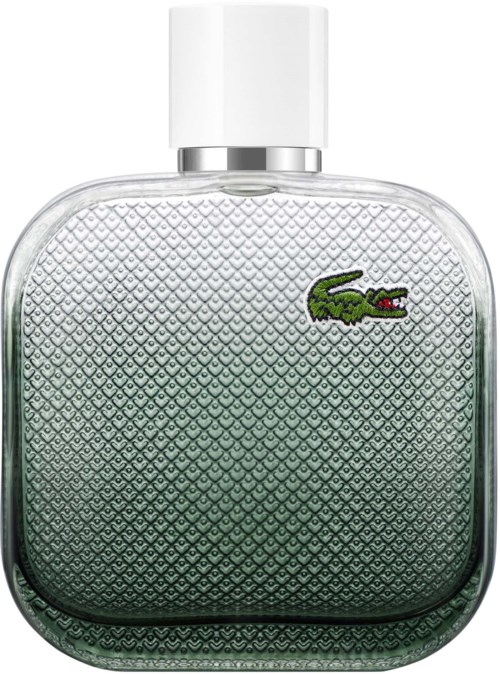 Een heldere glazen fles met een witte dop, met een kleine groene krokodille-logo. Het lijkt op een parfum of aftershave.
