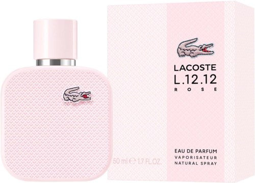 Roze Lacoste-parfumfles met krokodillenaam en bijpassend doosje met tekst en krokodillafoto.