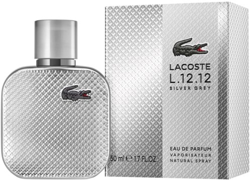 Een zilvergrijze Lacoste-parfumfles met krokodillogo en bijpassende doos.