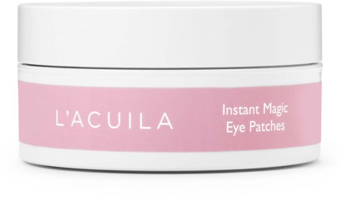 A white jar with a pink label that says 'L'ACULA Instant Magic Eye Patches.'