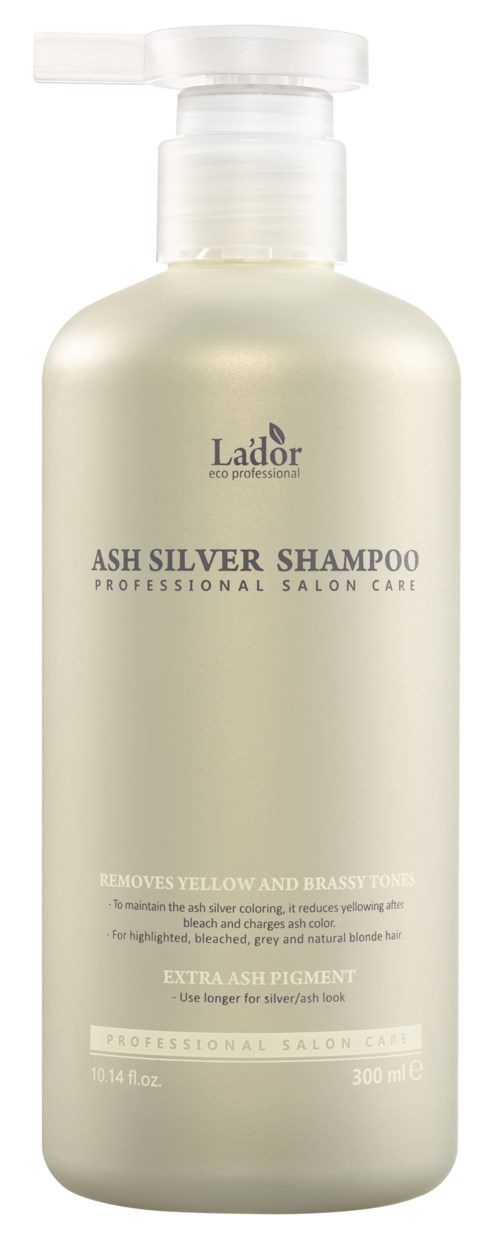 Een witte fles Lador Ash Silver Shampoo met pomp, bedoeld voor haarverzorging en het verwijderen van gele tonen.