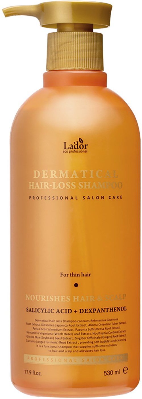 Een perzikkleurige pompflacon met Lador-logo, haarverzorging voor dun haar, 530 ml, met salicylzuur en dexapanthol.