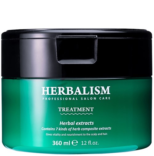 En grön burk med svart lock, märkt "HERBALISM" och information om hårbehandling med örtutdrag.