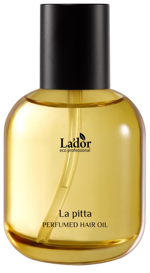 Een kleine, ronde fles met lichtgele haarolie, zwarte dop en etiket met de tekst "La pitta" en "PERFUMED HAIR OIL."