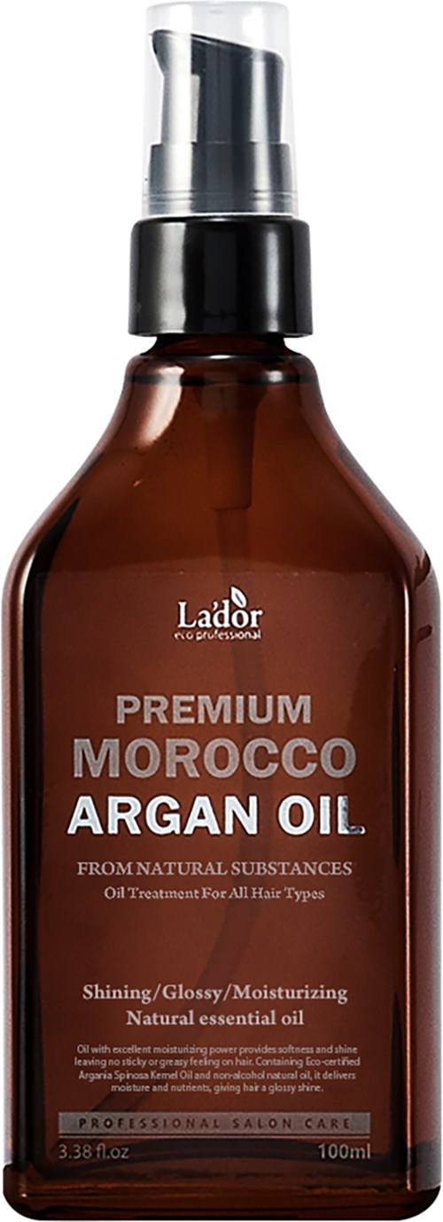 Brun flaske med marokkansk arganolje for hår med pumpe. Merket Ladur og fordeler som glans og fuktighet er synlige.